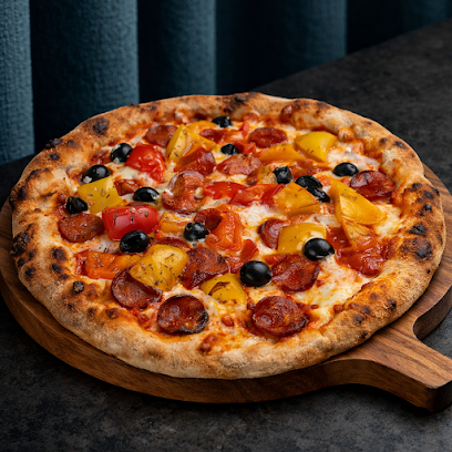Pizza de HENRI Pizza - Distributeur de pizzas artisanales | 24h/24 7j/7 à Riom